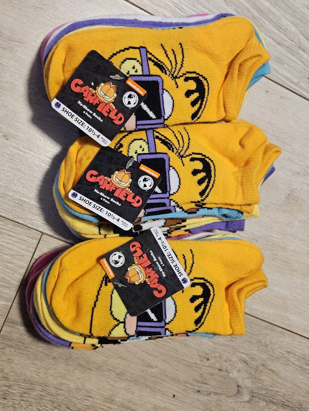 Nickelodeon Garfield No-Show Socks in Bright Yellow with Purple Accents (Pack)